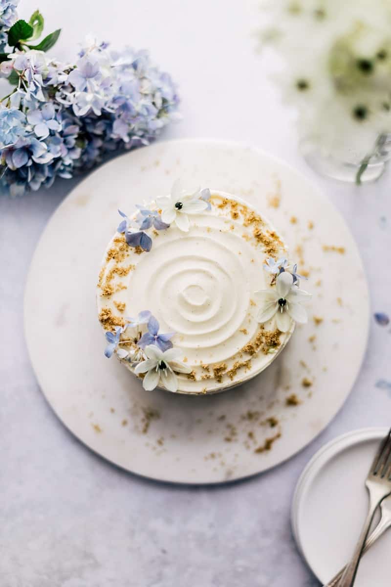 Carrot cake decorated with organic flowers.