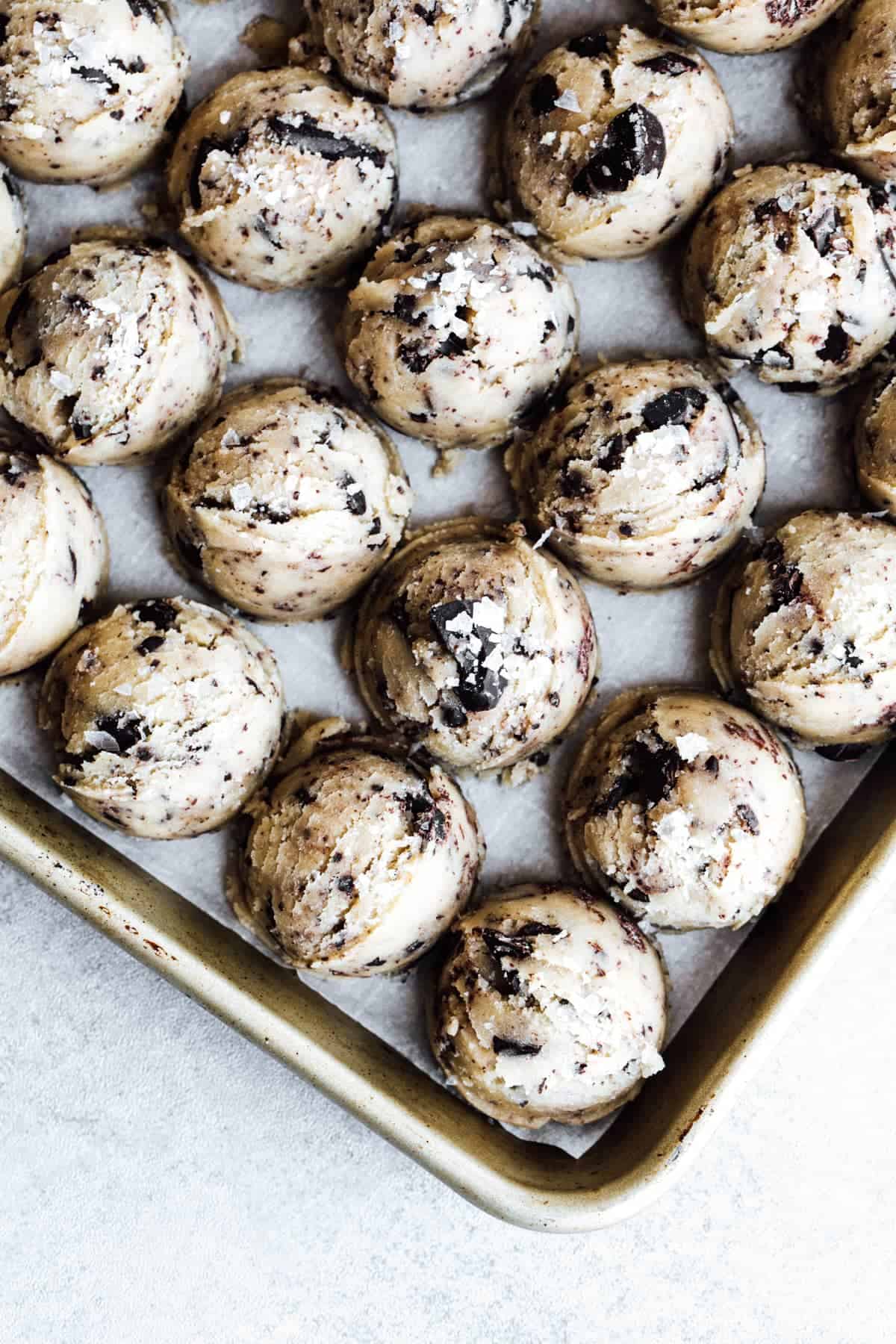Cookie dough on a baking sheet.