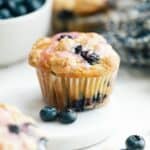 Blueberry lavender muffins on a plate.