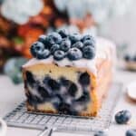 Blueberry ricotta pound cake on a wire rack.