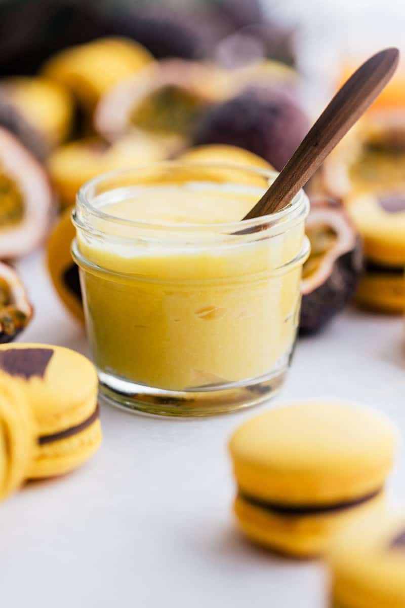 Jar of passion fruit curd in a jar.