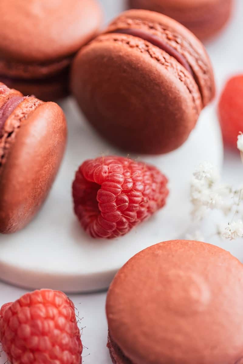 Fresh raspberries and Yuzu Raspberry Macarons.