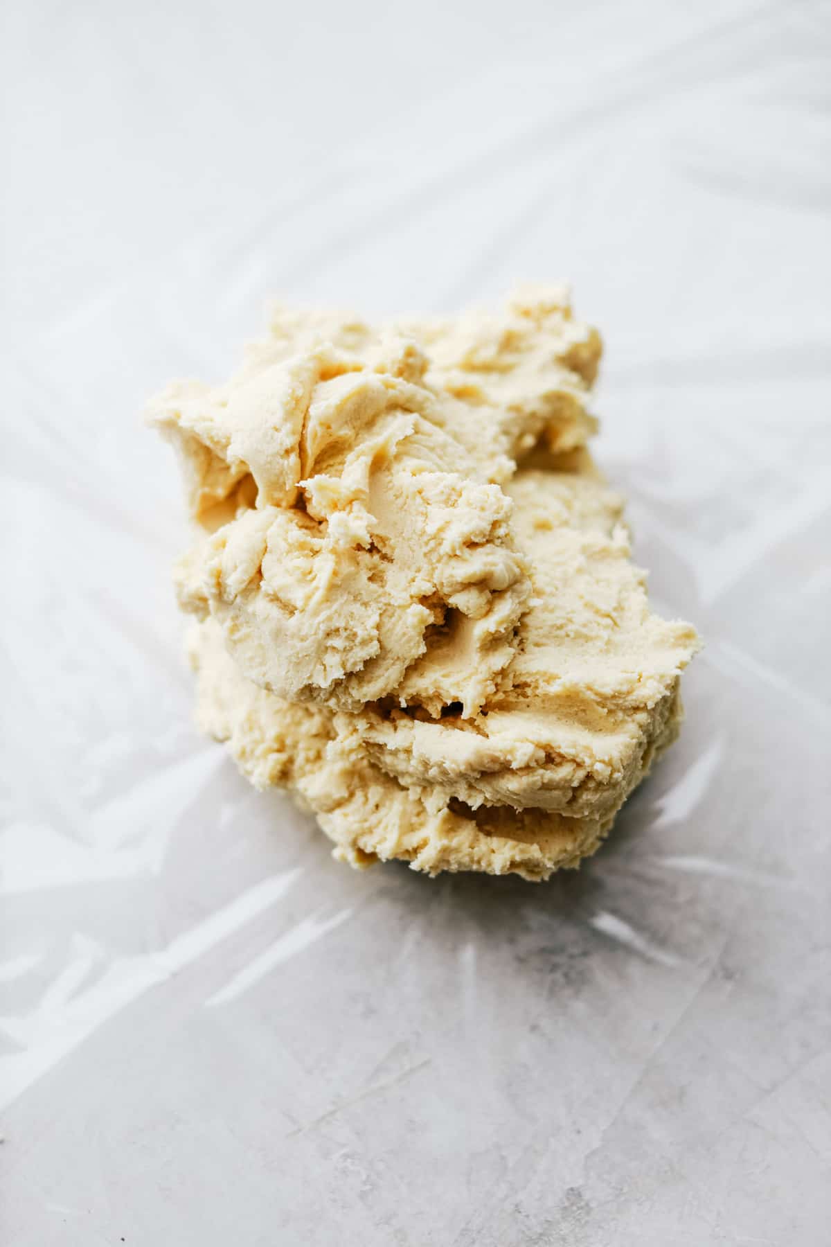 Mixed tart dough, prepared to be chilled.