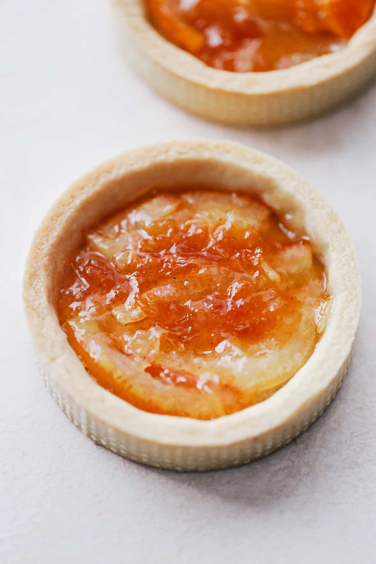 Orange marmalade in mini tarts.