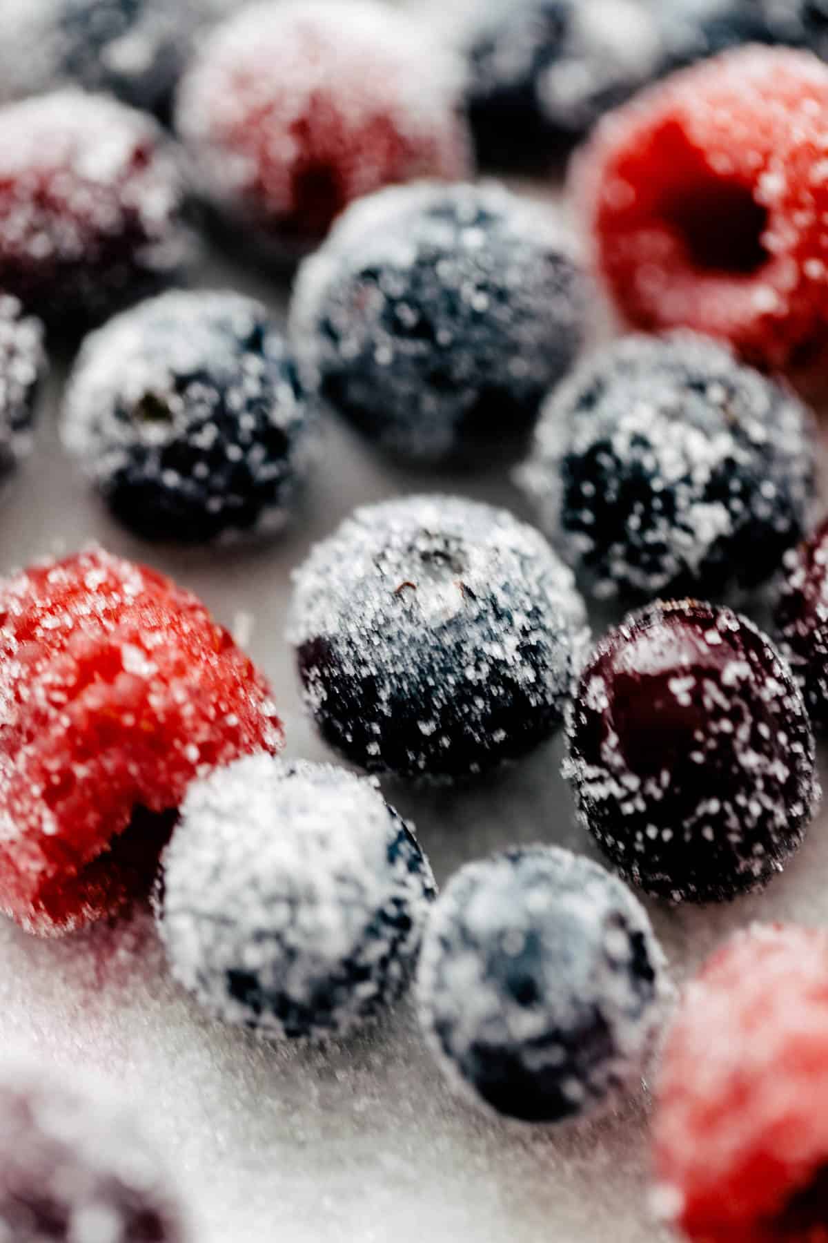 Finished sugared berries coated in granulated sugar.
