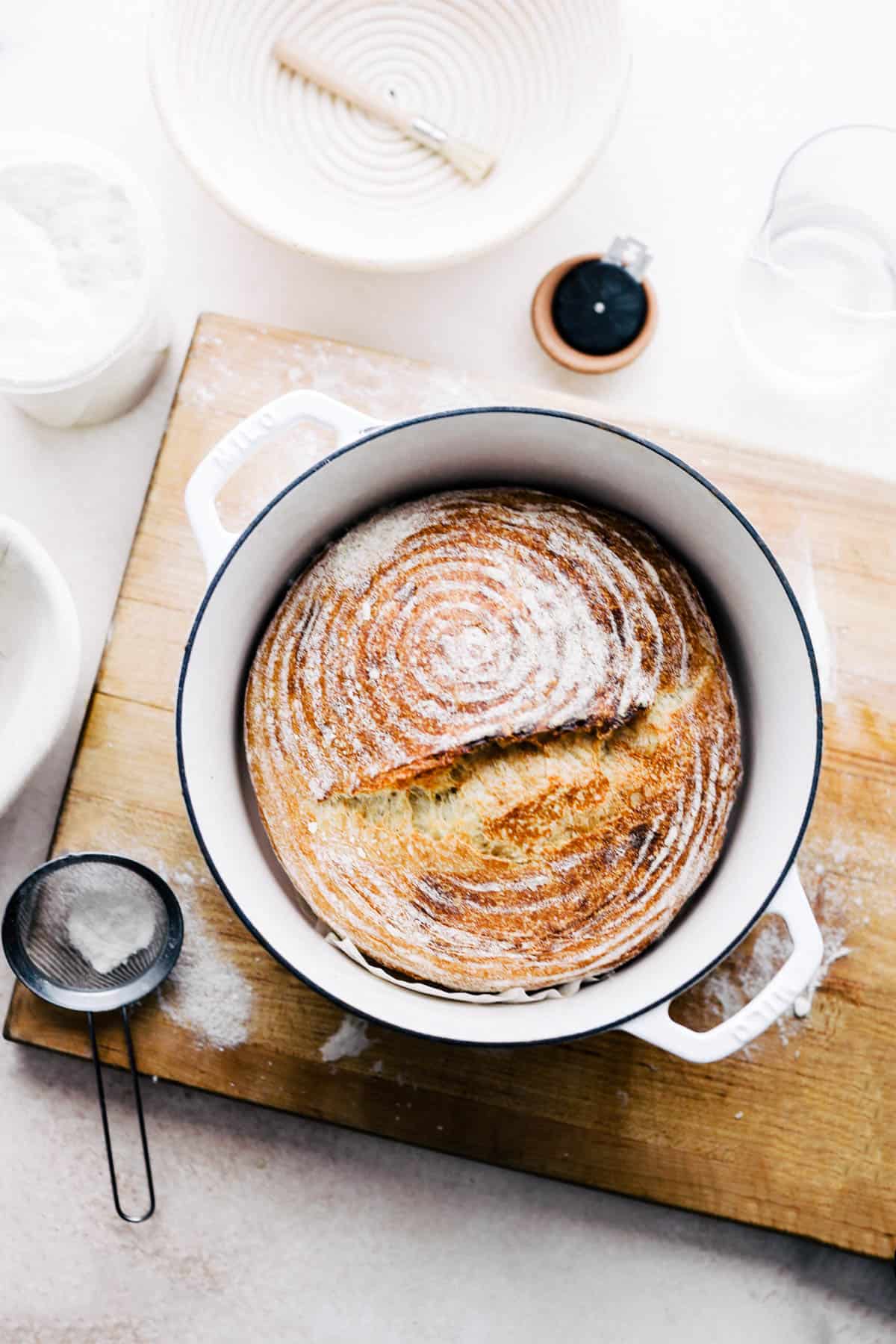 Sourdough Bread made in a dutch oven with tools needed.