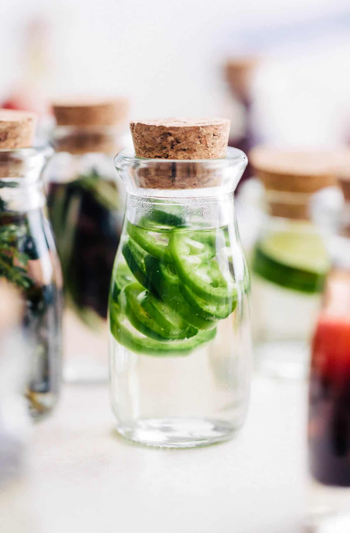 Closeup of Jalapeno Simple Syrup in a glass jar.