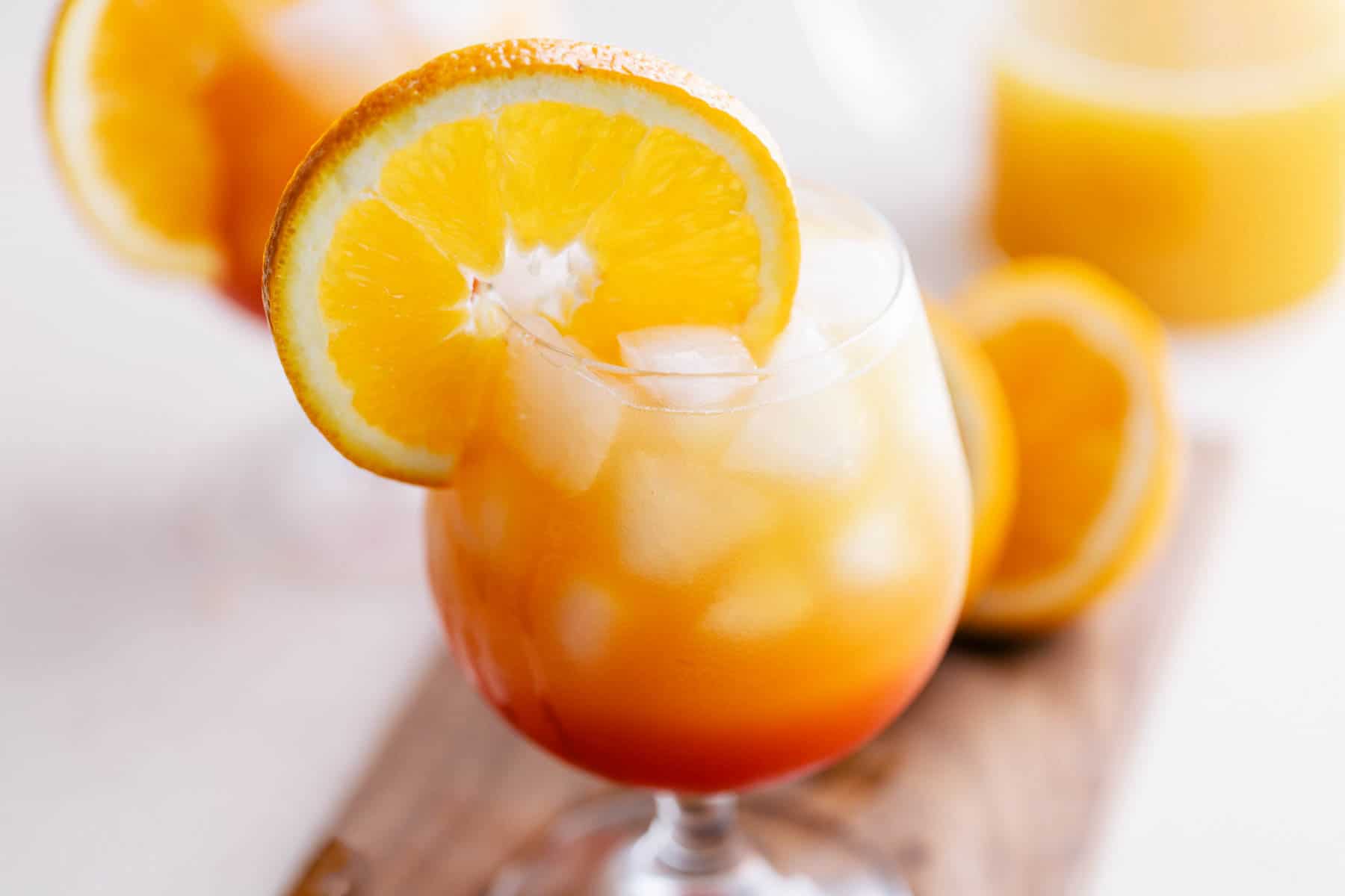 Close up view of a Vodka Sunrise cocktail.