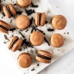 Pumpkin Spice Macarons with Dark Chocolate Ganache.