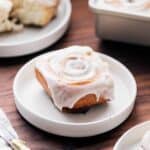 Brioche cinnamon rolls on a small plate.