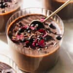 Chocolate mousse cups with chocolate perils.