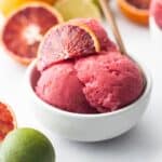 Blood orange sorbet in a bowl.