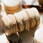 Cinnamon macarons on the counter.