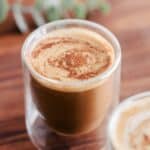 Brown sugar oatmilk cortado in a small cup.