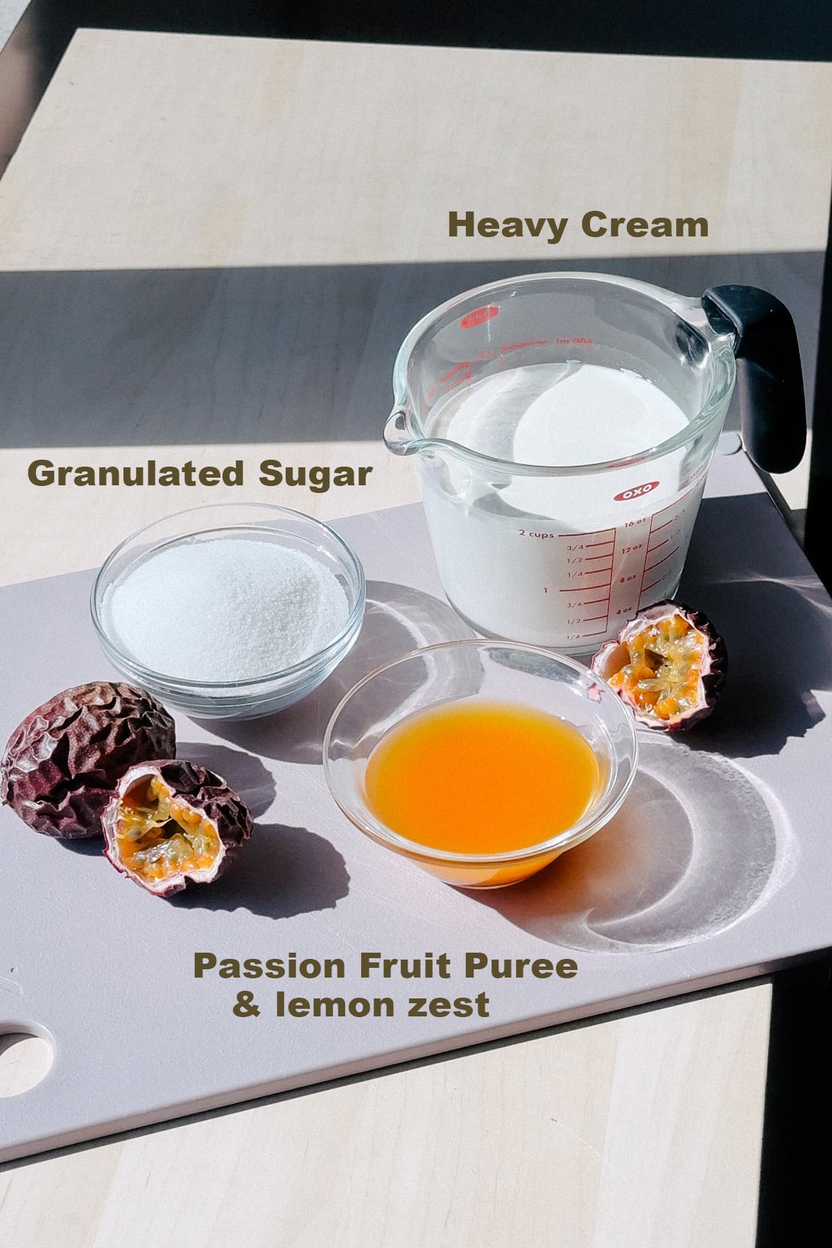 Ingredients needed to make passion fruit puree on the counter labeled. 