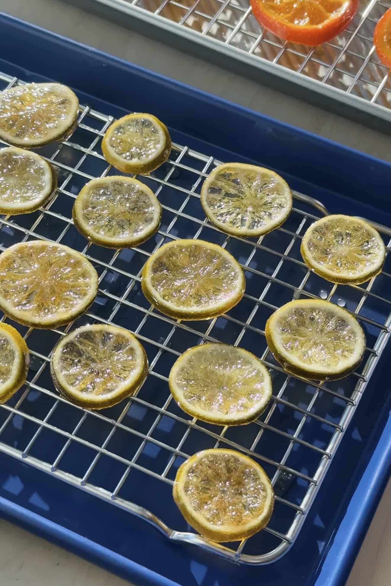 Candied limes on a cooling rack.