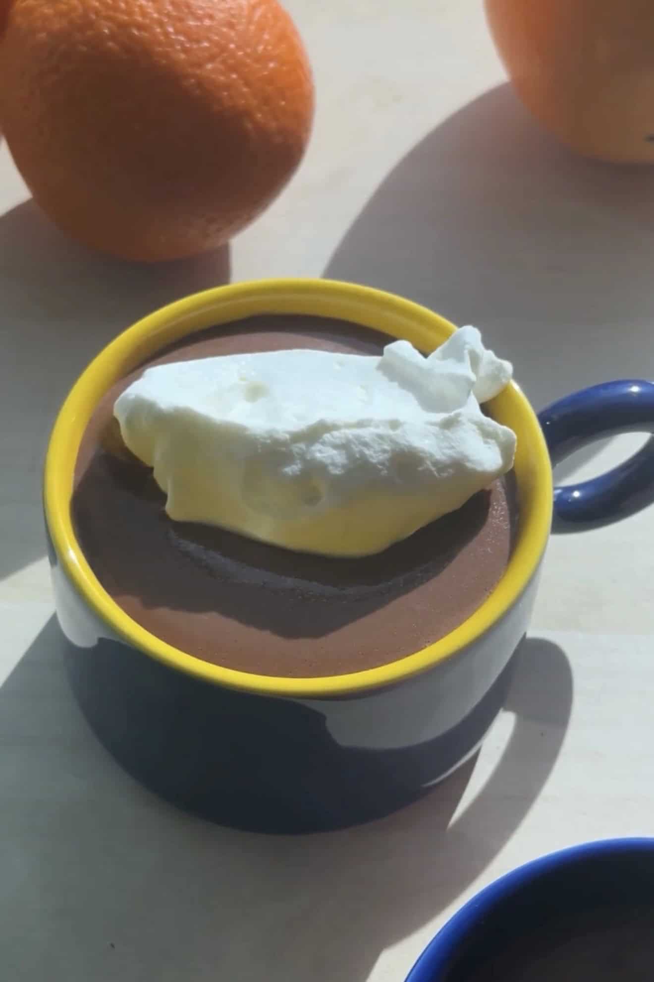 parisian hot chocolate with softly whipped cream on top.