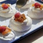 Candied Kumquat Pavlova Nest on a baking sheet.
